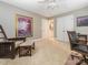 Bedroom featuring a work desk and a comfortable seating area for relaxation at 7040 Edenderry Dr, Charlotte, NC 28270