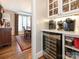 Butler's pantry featuring a wine cooler conveniently located near the dining room at 7040 Edenderry Dr, Charlotte, NC 28270