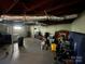Basement featuring painted walls, wooden beams, and some contents at 739 Owls Den Rd, Lincolnton, NC 28092