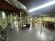 Basement featuring painted walls, wooden beams, and some storage at 739 Owls Den Rd, Lincolnton, NC 28092