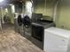 Modern laundry room equipped with advanced washer and dryer appliances at 739 Owls Den Rd, Lincolnton, NC 28092