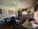 Cozy living room with sofas, a coffee table, and a chandelier at 739 Owls Den Rd, Lincolnton, NC 28092