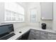 Bright office space featuring a built-in desk, drawers and window with views at 809 Brown Creek Dr, Matthews, NC 28104