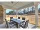 Covered patio with outdoor furniture and a view of the fenced-in backyard at 809 Brown Creek Dr, Matthews, NC 28104