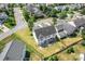 Aerial view of a home with a spacious backyard, patio area, and well-maintained landscaping in a suburban setting at 9639 Ravenscroft Nw Ln, Concord, NC 28027