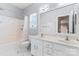 Bathroom with double sinks, marble floors, shower and tub combo at 9639 Ravenscroft Nw Ln, Concord, NC 28027