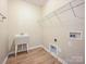 Laundry room has a utility sink and space for washer and dryer hookups at 9700 Ravenscroft Nw Ln, Concord, NC 28027
