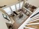 A bird's eye view of a living room featuring a sitting area, fire place, and dining area at 9700 Ravenscroft Nw Ln, Concord, NC 28027