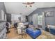 Spacious primary bedroom featuring vaulted ceiling, padded headboard and ensuite bath at 9718 Eagle Feathers Dr, Charlotte, NC 28214