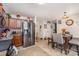 Cozy eat-in kitchen with stainless steel refrigerator and adjacent dining area at 9718 Eagle Feathers Dr, Charlotte, NC 28214