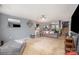 Spacious living room featuring neutral walls, carpet flooring, contemporary furnishings, and ample natural light at 9718 Eagle Feathers Dr, Charlotte, NC 28214