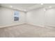 Bright bedroom features plush carpet and natural light at 9952 Manor Vista Trl, Kannapolis, NC 28027