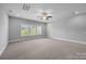 Bright bonus room with carpet and natural light with views of the outdoors at 1012 N Sharon Amity Rd, Charlotte, NC 28211
