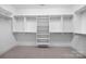 Spacious walk-in closet with custom shelving and ample storage space at 1012 N Sharon Amity Rd, Charlotte, NC 28211