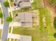 Detailed aerial view featuring rooftops, driveways, and green landscaping in a residential neighborhood at 1044 Shiloh Bend Trl, Fort Mill, SC 29715