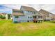 Expansive backyard featuring a screened porch, perfect for outdoor relaxation and entertaining at 1044 Shiloh Bend Trl, Fort Mill, SC 29715