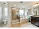 Bathroom featuring tiled shower, soaking tub, and single vanity at 1044 Shiloh Bend Trl, Fort Mill, SC 29715
