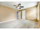 Bedroom with carpeted floors, a ceiling fan, and bright windows at 1044 Shiloh Bend Trl, Fort Mill, SC 29715