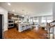 Spacious kitchen featuring dark cabinets, granite countertops, and stainless steel appliances at 1044 Shiloh Bend Trl, Fort Mill, SC 29715