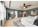 Large primary bedroom showcasing multiple doors, and carpeted floors at 1044 Shiloh Bend Trl, Fort Mill, SC 29715