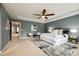Comfortable main bedroom featuring carpeted floors and neutral colors at 1044 Shiloh Bend Trl, Fort Mill, SC 29715