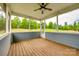 Spacious screened porch with natural wood flooring and exterior views at 1044 Shiloh Bend Trl, Fort Mill, SC 29715