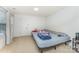 Bright bedroom with a comfortable bed, neutral carpet, and plenty of natural light at 1105 Bottle Brush Ln, Harrisburg, NC 28075