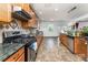 Spacious kitchen with granite countertops, stainless steel appliances, and ample cabinet space at 1105 Bottle Brush Ln, Harrisburg, NC 28075