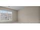 Cozy bedroom with neutral paint and a window offering natural light at 12407 Crowley Ct, Charlotte, NC 28277