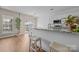 Stylish kitchen with granite countertops, stainless steel appliances, and bar seating at 12407 Crowley Ct, Charlotte, NC 28277