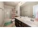 Bathroom featuring double sinks, tile flooring, and a shower-tub combo at 130 Bay Laurel Dr, Mooresville, NC 28115