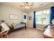 Cozy bedroom with natural light, inviting bed, and calming decor for restful nights at 130 Bay Laurel Dr, Mooresville, NC 28115