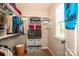 Organized closet with ample shelving and hanging space for clothing and accessories at 130 Bay Laurel Dr, Mooresville, NC 28115