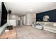 Bright living room features comfortable seating, modern decor, and ample natural light at 130 Bay Laurel Dr, Mooresville, NC 28115