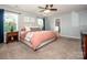Bright main bedroom with a luxurious bed, side tables, and bright windows at 130 Bay Laurel Dr, Mooresville, NC 28115