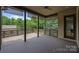 Relaxing covered porch offers a peaceful outdoor retreat at 14010 Mccord Rd, Huntersville, NC 28078