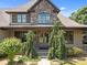Charming stone accented home featuring mature landscaping at 14010 Mccord Rd, Huntersville, NC 28078