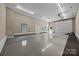 Spacious three car garage with ample room for storage and parking at 14010 Mccord Rd, Huntersville, NC 28078
