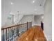 Wide hallway with hardwood floors, high ceilings and a decorative chandelier at 14010 Mccord Rd, Huntersville, NC 28078