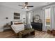 This bedroom is adorned with two windows, decorative wall decor, and hardwood-style flooring at 1634 Dresden Dr, Rock Hill, SC 29732