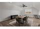 Large dining room with plenty of space, featuring stylish furniture and a ceiling fan at 1634 Dresden Dr, Rock Hill, SC 29732