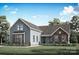 Charming craftsman-style home with stone accents and a beautifully landscaped front yard at 1634 Dresden Dr, Rock Hill, SC 29732