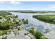 Scenic aerial view of the lake community featuring lush green trees, boat docks, and serene waters at 165 Cardinal Dr # 615, New London, NC 27371