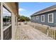 View from the back deck showing the spacious deck and railing at 165 Cardinal Dr # 615, New London, NC 27371