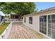 Spacious deck with sliding glass door and white railing for outdoor entertaining at 165 Cardinal Dr # 615, New London, NC 27371
