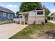 Charming single story home with neutral siding, covered front porch and manicured lawn at 165 Cardinal Dr # 615, New London, NC 27371