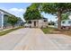 Charming home with a welcoming front porch, a side deck, and a spacious driveway at 165 Cardinal Dr # 615, New London, NC 27371