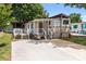 Charming home with a welcoming front porch, a side deck, and a spacious driveway at 165 Cardinal Dr # 615, New London, NC 27371