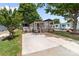 Charming home with a welcoming front porch, a side deck, and a spacious driveway at 165 Cardinal Dr # 615, New London, NC 27371