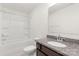 Well-lit bathroom featuring granite counters and a shower-tub combo at 165 Clove Hitch Dr # I281, Statesville, NC 28677